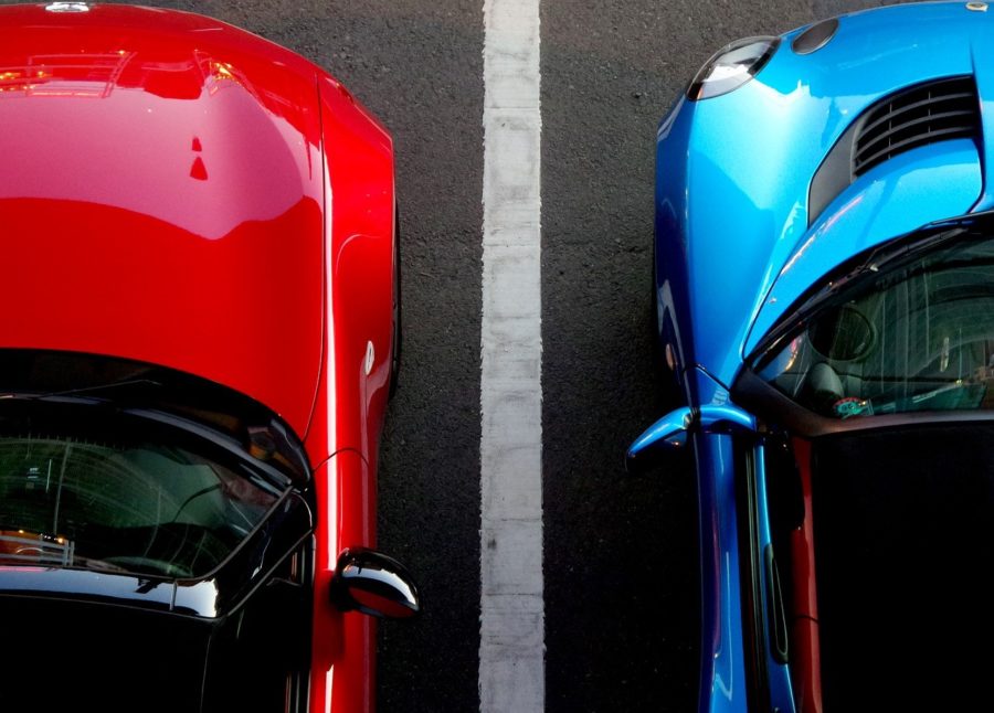 Two cars bay parked