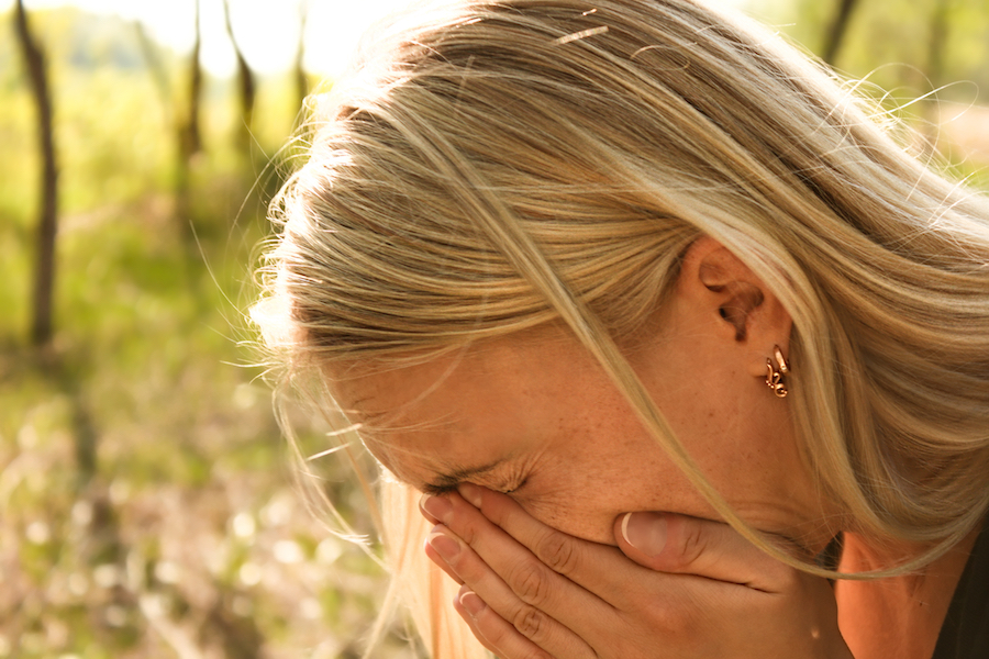 girl sneezing hayfever